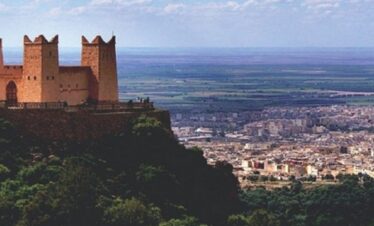 Fortress perched on a hill overlooking a Moroccan city