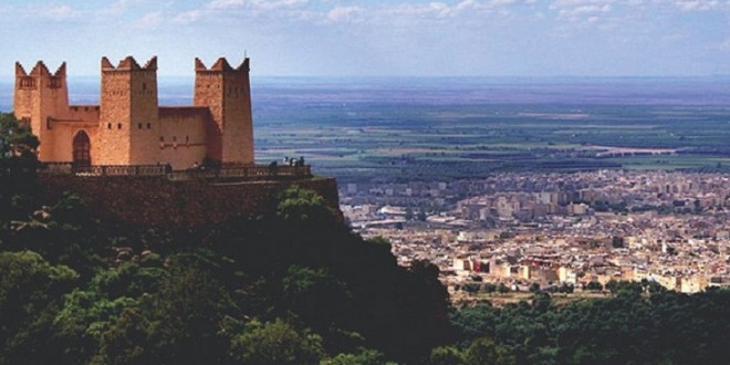 Fortress perched on a hill overlooking a Moroccan city