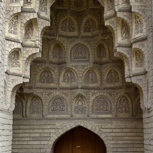 Ornate Islamic architectural arch with carvings