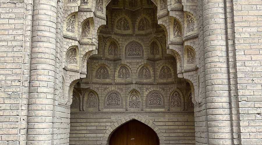 Ornate Islamic architectural arch with carvings