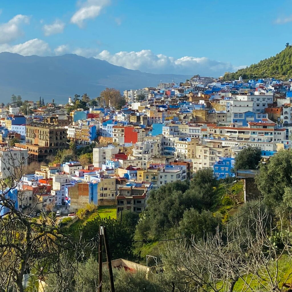 Blue city on mountain slope