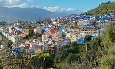 Blue city on mountain slope