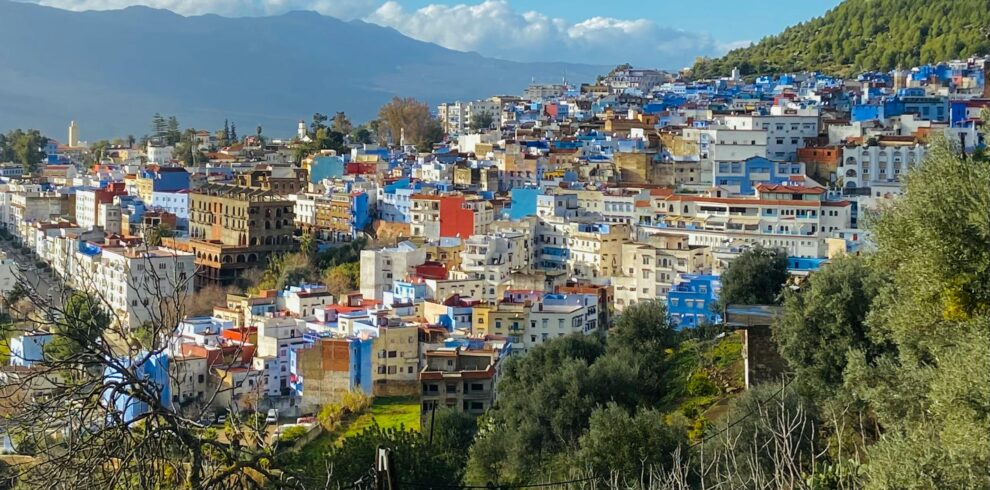Blue city on mountain slope