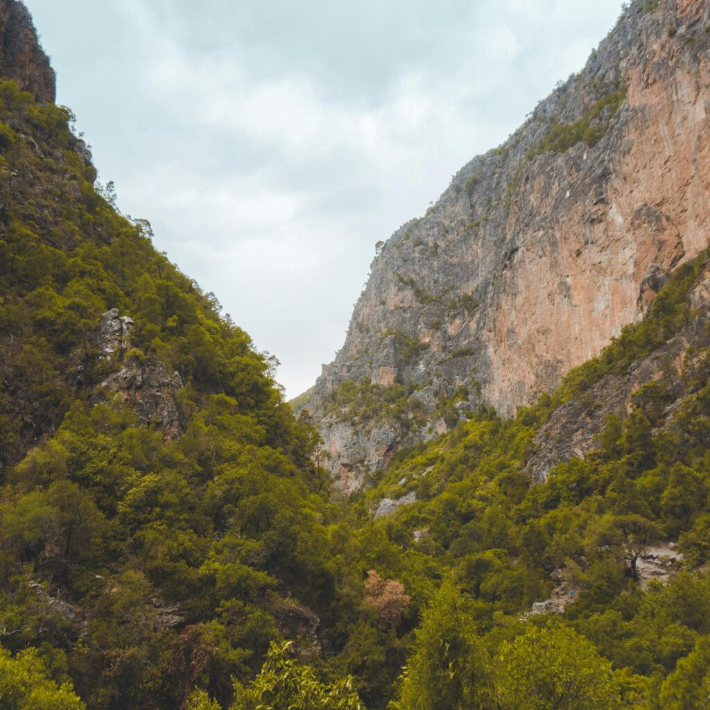 Hikers exiting a vast canyon in Morocco