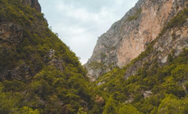 Hikers exiting a vast canyon in Morocco