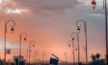 Sunset boulevard with streetlamps in coastal Morocco