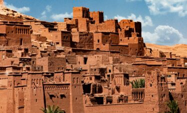 Traditional Moroccan village made of red clay buildings