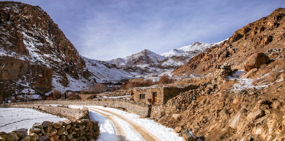 Winding road through snowy Atlas Mountains in Morocco