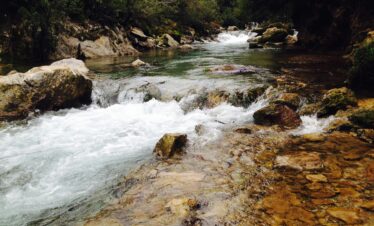 Overview of Chefchaouen’s blue rooftops and mountain backdrop