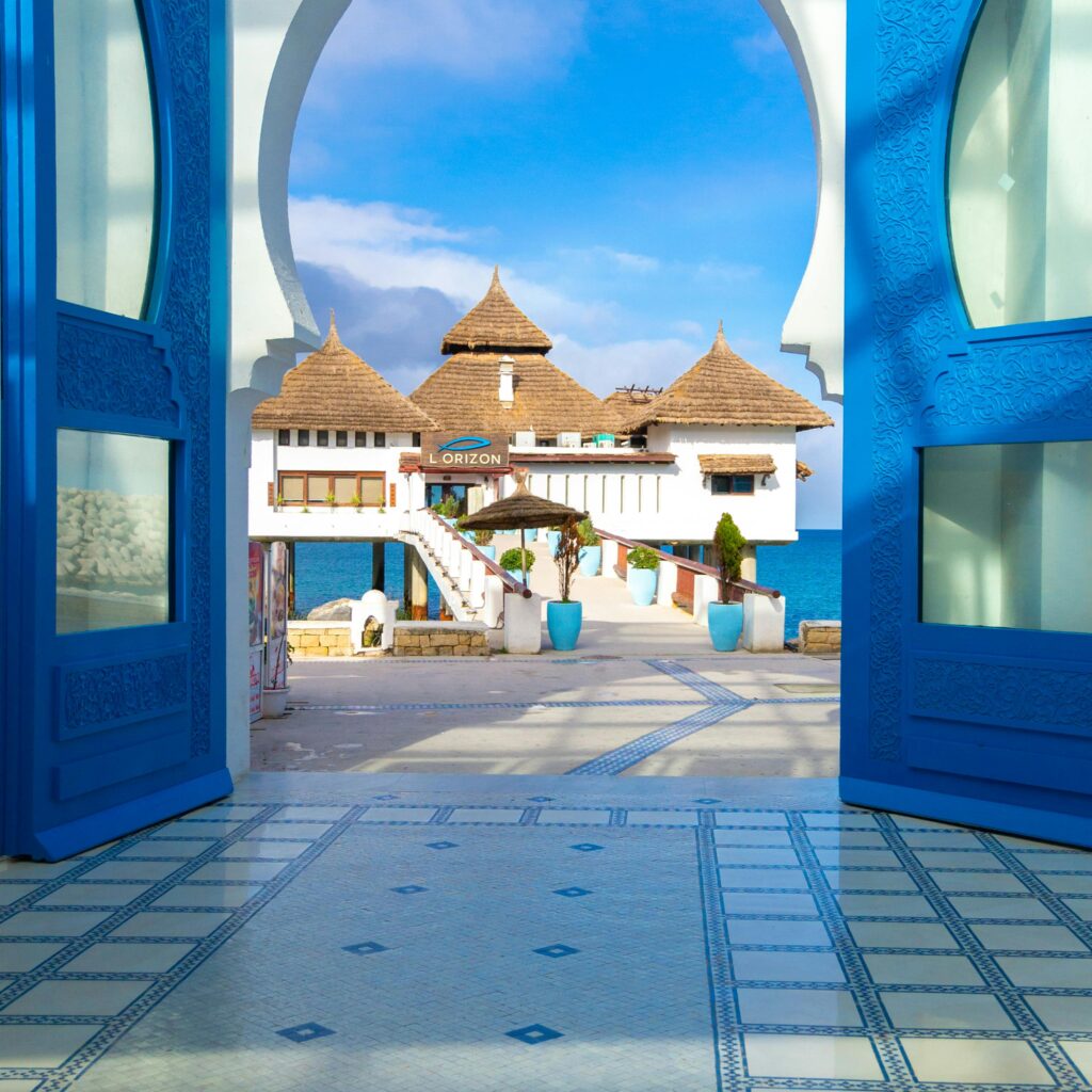 Curved archway and steps painted blue in Moroccan medina