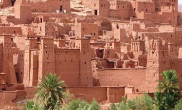 Fortified city glowing in evening light