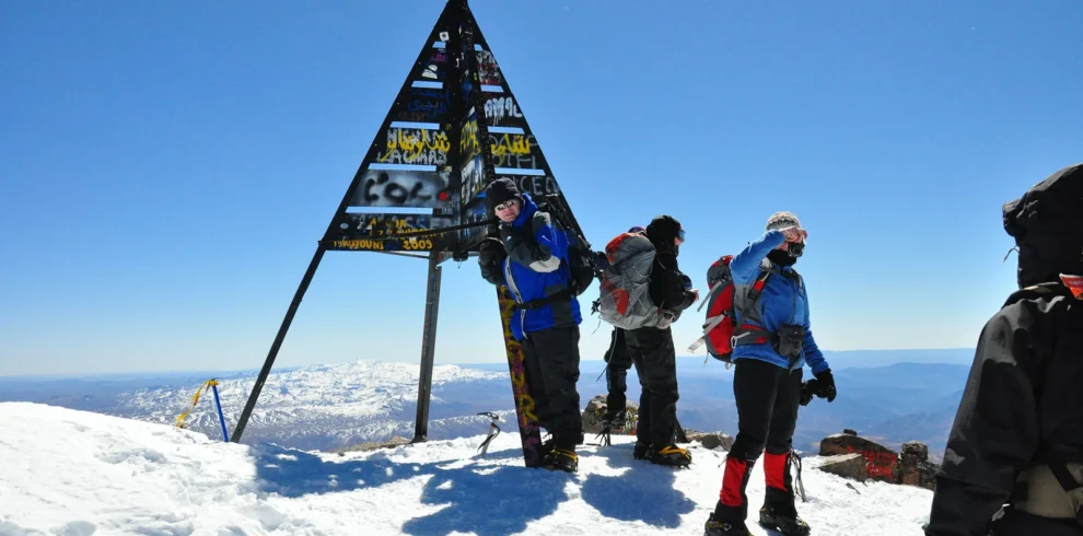Hikers posing at Toubkal’s summit