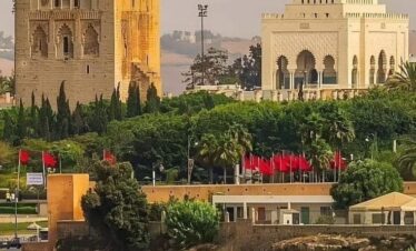Wide cityscape of Rabat from a garden in Salé