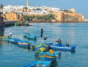 Traditional blue fishing boats on the river