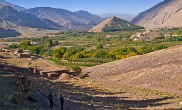 Moroccan farmland and green plots in a hilly region.