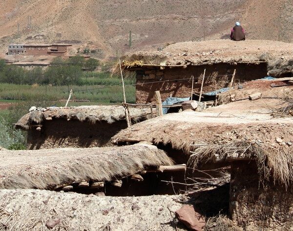 Stone house on a hill in the Moroccan countryside.