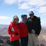 Home - Hayya Morocco Group of hikers on a trail with mountain views
