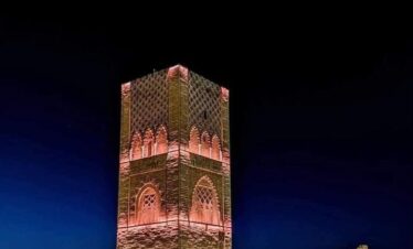 Illuminated Hassan Tower in Rabat at night