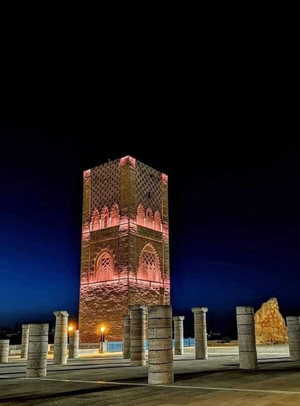 Illuminated Hassan Tower in Rabat at night