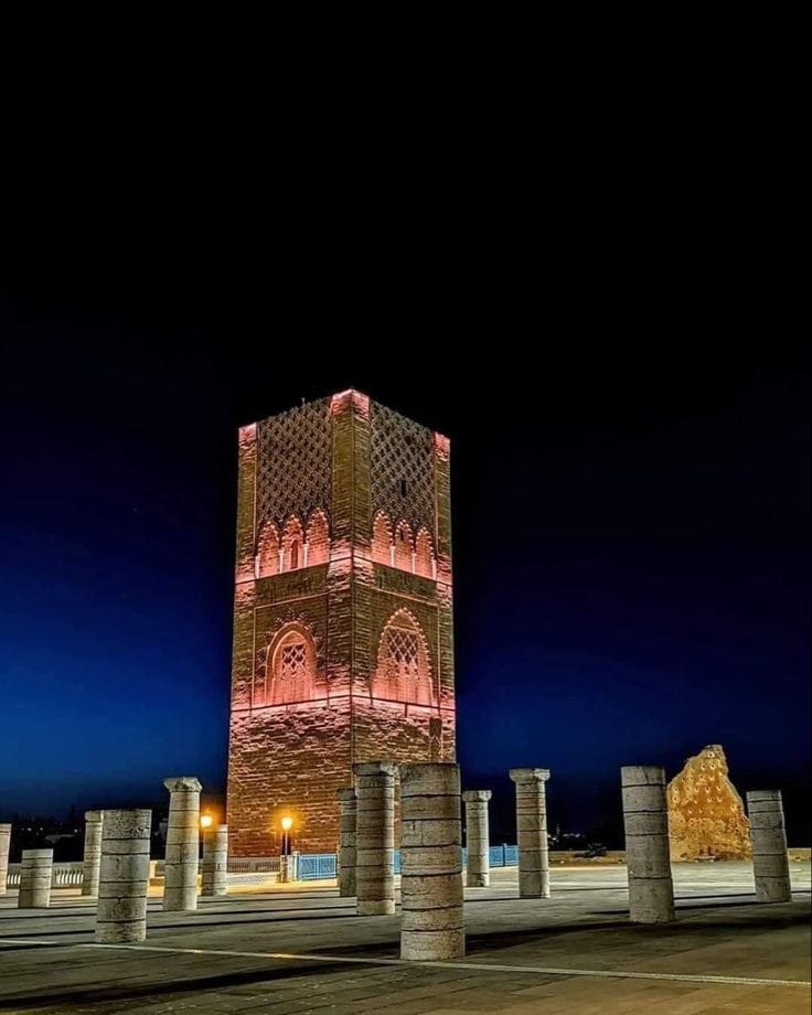 Illuminated Hassan Tower in Rabat at night