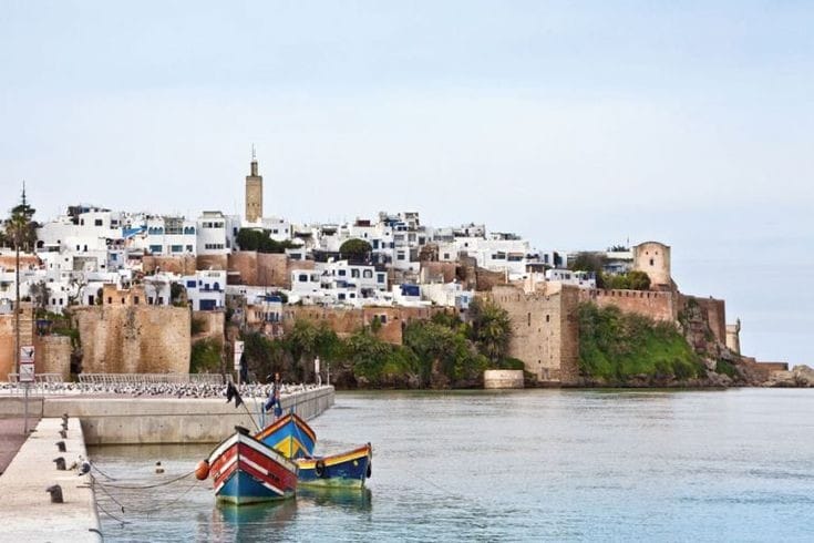 Scenic river view in Rabat with boats and cityscape
