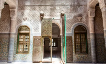 Moroccan building with mosaic tiles and columns