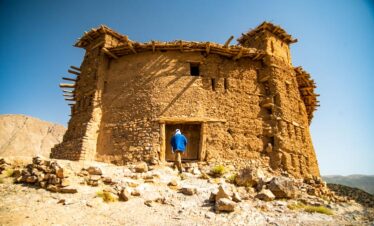 Old-style Berber house with mud walls in rural Morocco.