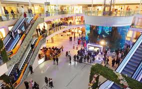 Shoppers in a circular open-plan mall