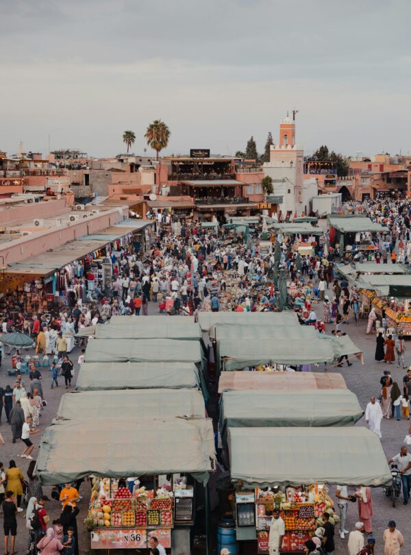 Handcrafted Moroccan baskets and slippers for sale.