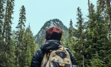Snow-covered Moroccan village surrounded by mountains.