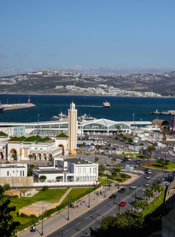Large mosque with a tall minaret by the sea