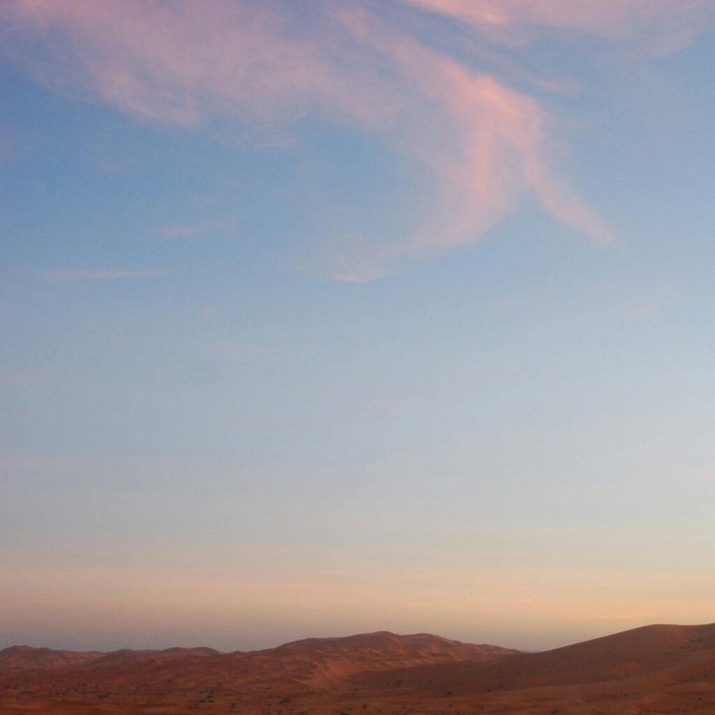 Sunset over the sandy horizon