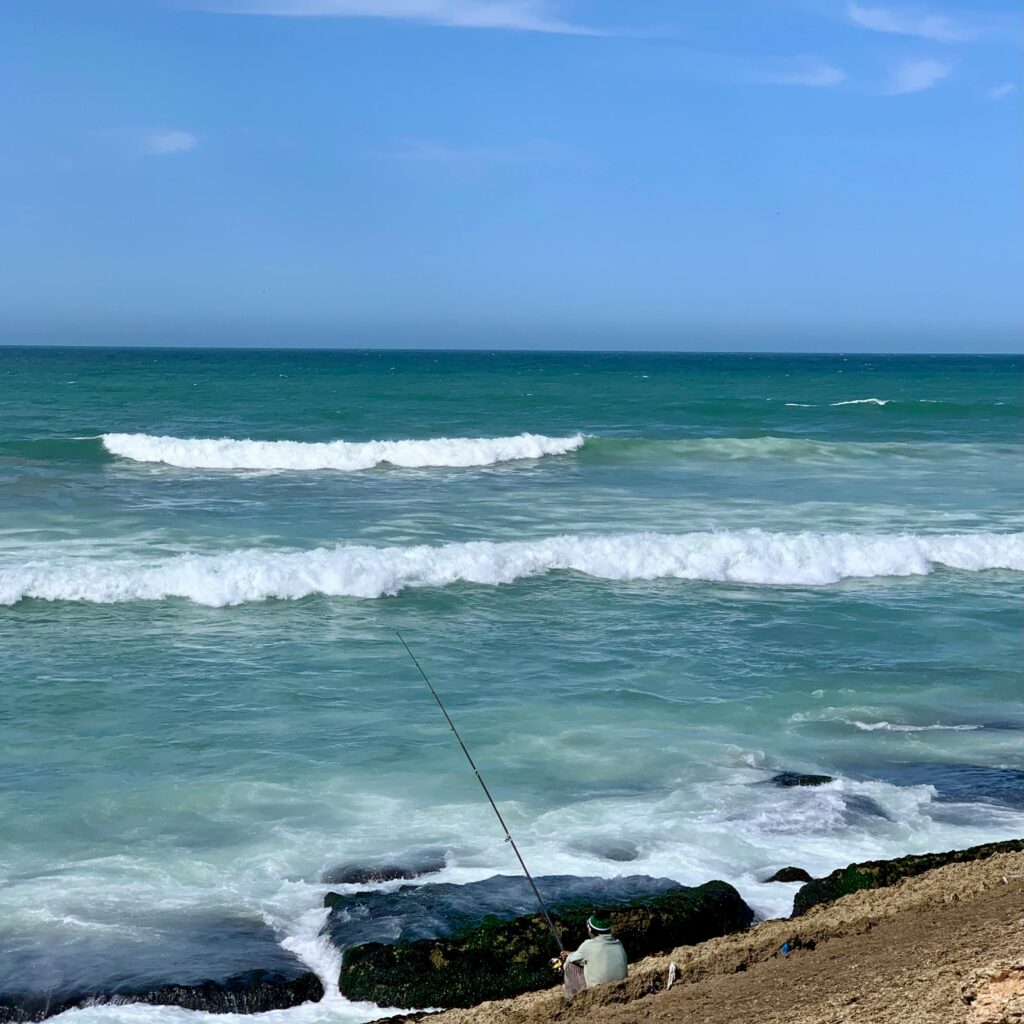 View of ocean waves crashing onto the shore
