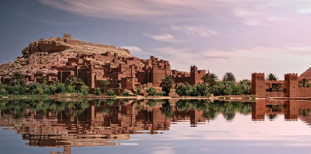 Narrow kasbah passageway with shadows and light