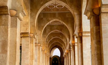Interior with chandeliers and prayer carpets