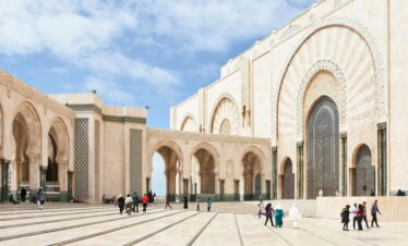 Wide open mosque courtyard with archway