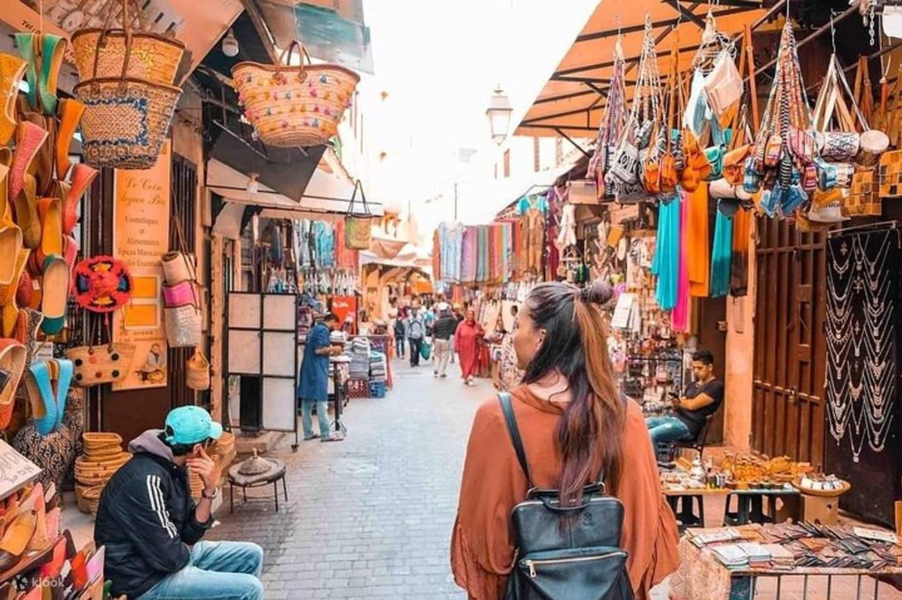 morocco travel packages tours - Hayya Morocco https://res.klook.com/images/fl_lossy.progressive%2Cq_65/c_fill%2Cw_1295%2Ch_862/w_80%2Cx_15%2Cy_15%2Cg_south_west%2Cl_Klook_water_br_trans_yhcmh3/activities/rgqmfbqxkjybuhicvhod/MarrakechMedinaSouksPrivateHalf-DayWalkingTour.jpg