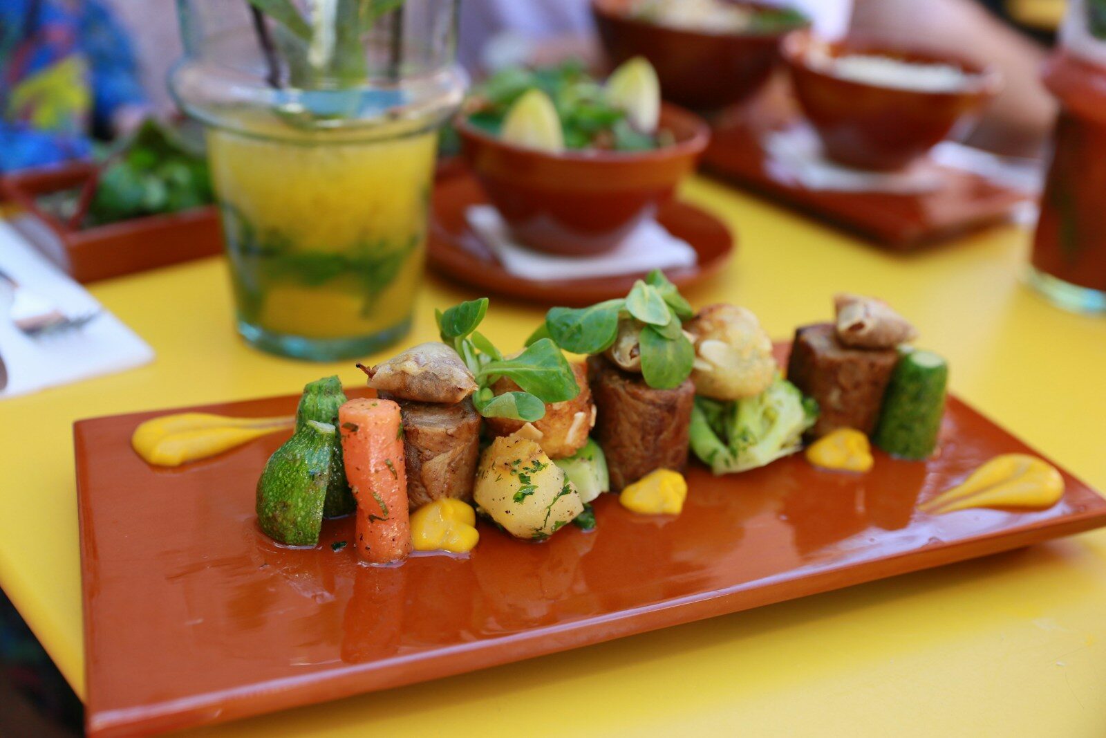 Food in Morocco a plate of food on a yellow table