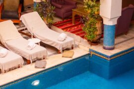Northern Morocco a large swimming pool with lounge chairs around it
