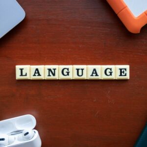 Language Landscape the word language spelled with scrabble tiles on a table