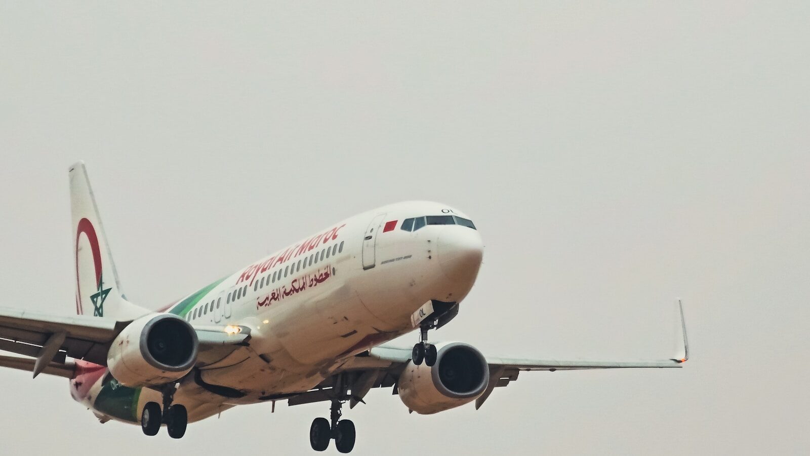 Royal Air Maroc A commercial airplane with landing gear extended