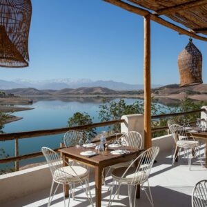 Eco-Friendly Tourism Restaurant patio offers a beautiful lake view.