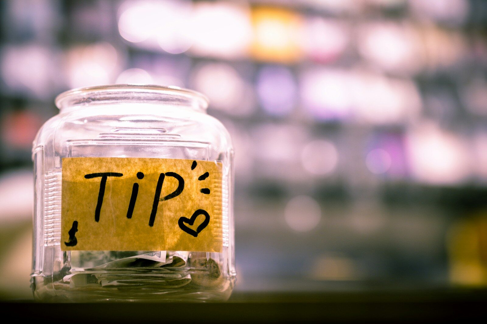clear glass jar Tipping Etiquette