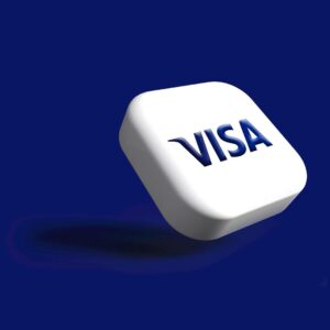 a white dice with the word visa on it Digital Visa Morocco Guide