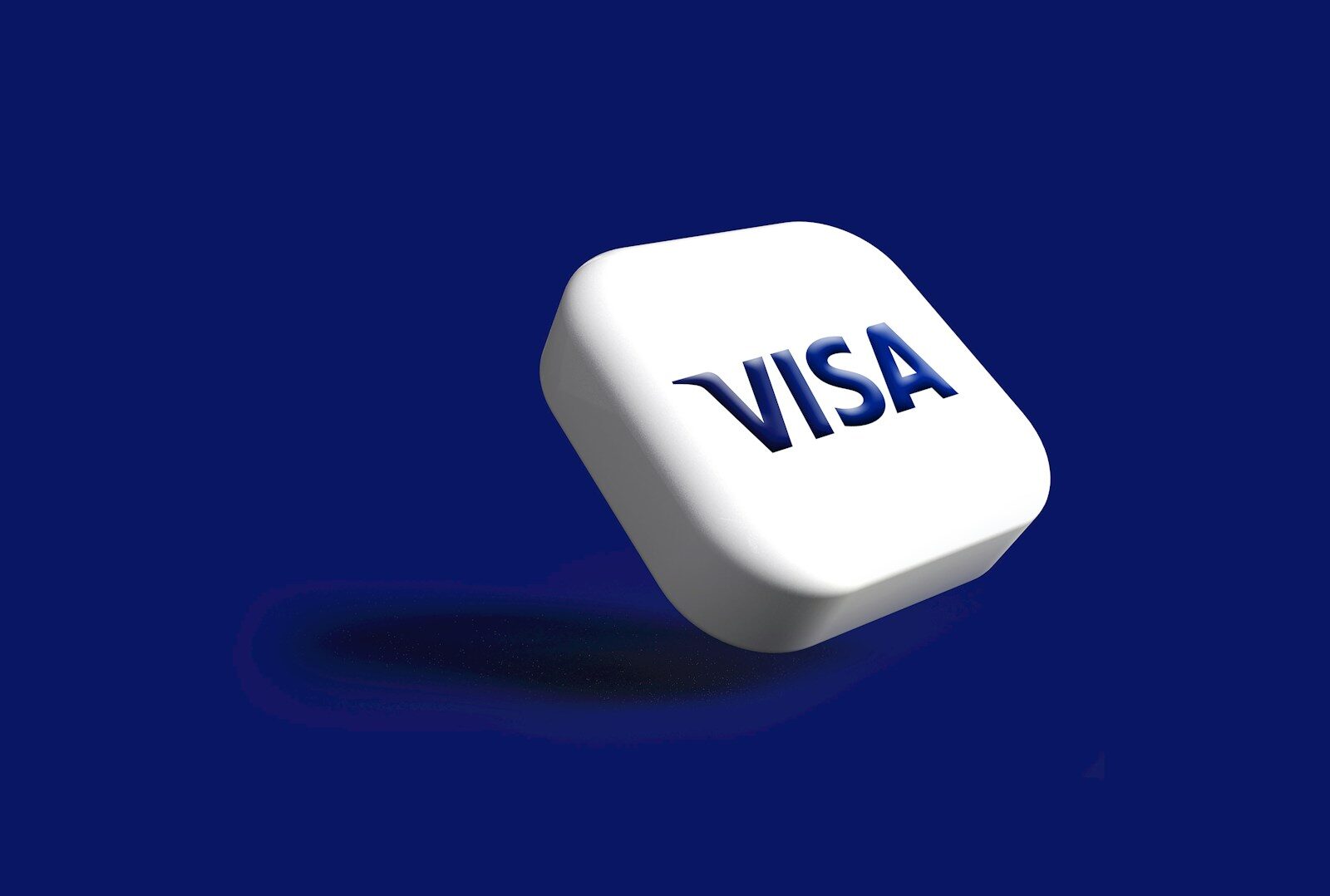 a white dice with the word visa on it Digital Visa Morocco Guide