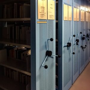 Historical Archives books in shelves in room