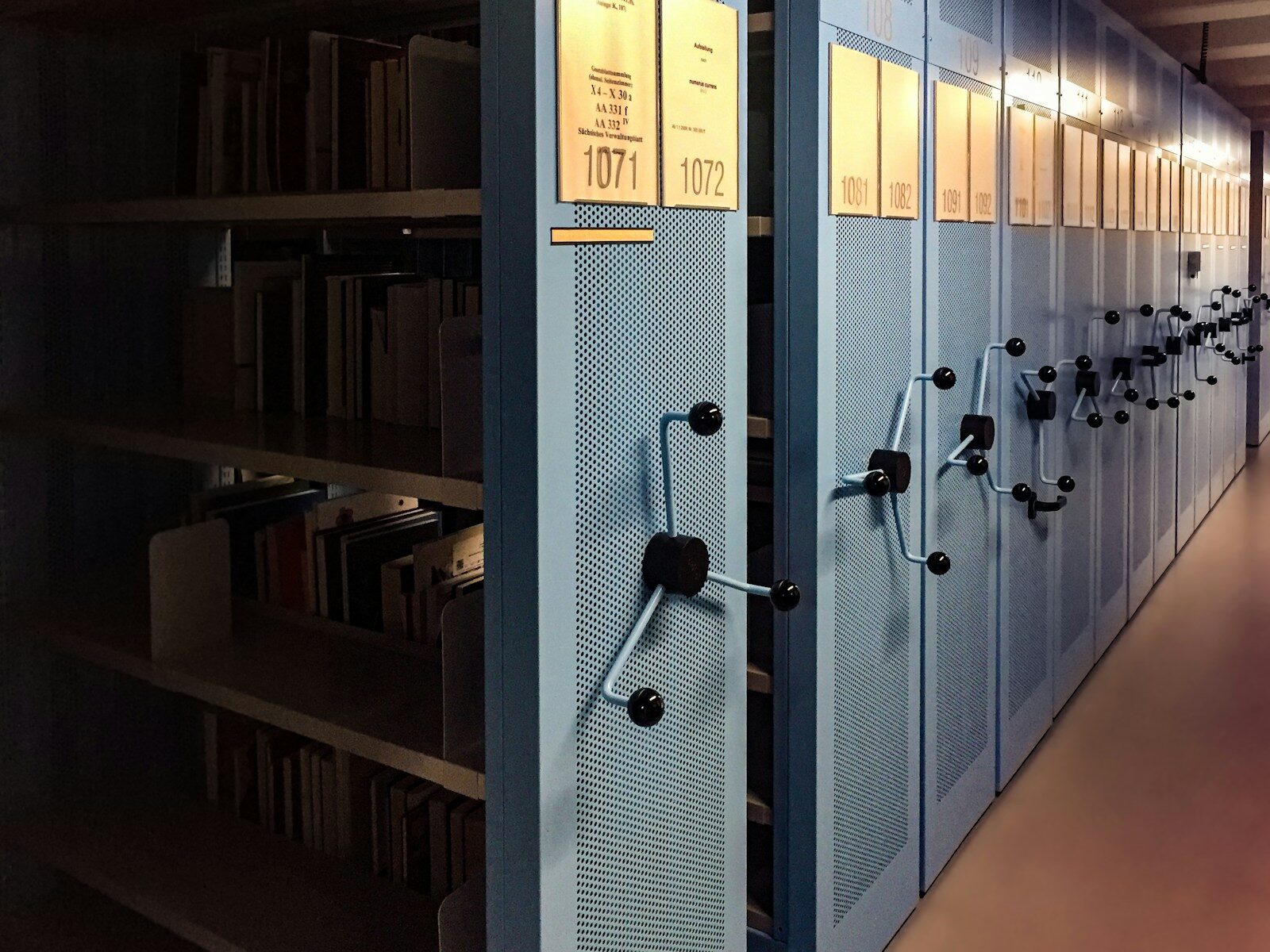 Historical Archives books in shelves in room