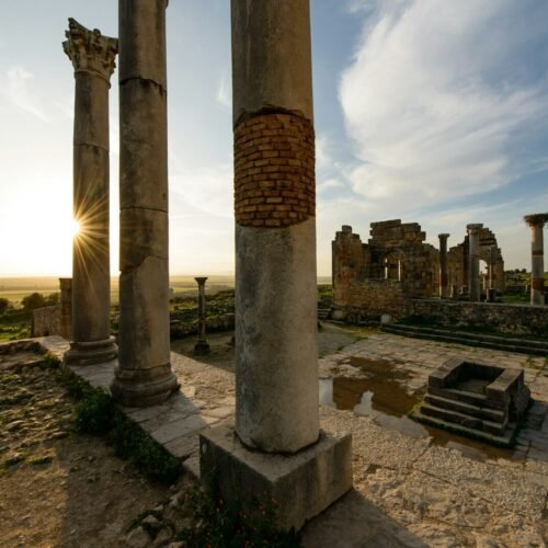 a stone building with pillars