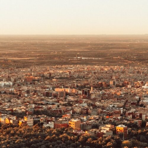 a view of a city from a hill