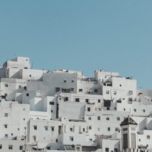white concrete building under blue sky during daytime